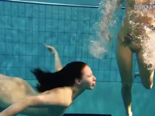 Girls Andrea and Monica Stripping One Another Underwater